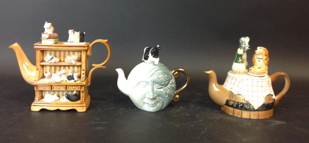 Group of Teapots - Andy Titcomb: Group of (3) Teapots - (1) Andy Titcomb; "Cow Jumped Over the Moon", (1) Paul Cardew "Special Cat Edition" (Slight Chip to Cat's Ear on Lid), (1) Cardew Design "Lady and The Tramp"