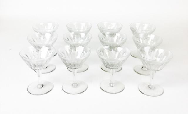 12 Baccarat Crystal Champagnes/Sherbets: 12 Baccarat French crystal champagnes/sherbets in Val de Loire pattern. Rim chipped on one. Each 5 1/4"H
