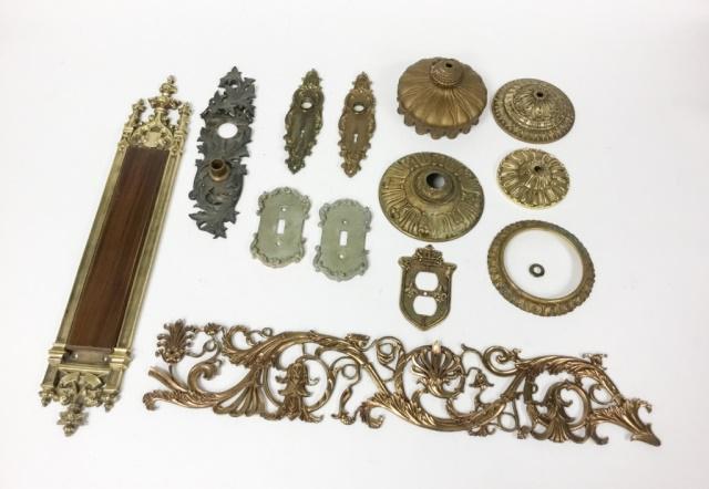 Gilt Bronze Hardware: Large group of gilt bronze hardware. Door plates, plug plate, light switch plate, ceiling caps.