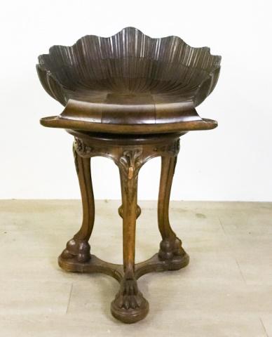 Italian Ornately Carved Shell Music Stool: Italian Carved Shell Music Stool, Ornately carved walnut swivel piano or grotto chair with shell seat and tripod carved feet Small Chip on Right Hand Side 26 1/2" H X 19 1/4" W X 21" D