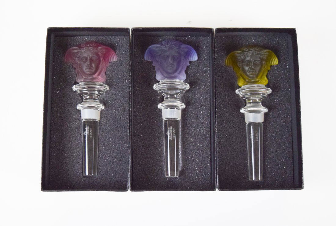 3 Rosenthal Meets Versace Medusa Bottle Stoppers: Rosenthal Versace crystal bottle stoppers with Rose (pink), Amethyst (purple), Amber (yellow) frosted glass Medusa head topper. This classic 80's accessory is the perfect luxe addition to any bar cart