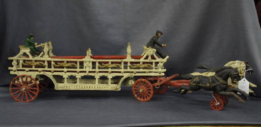 Vintage cast iron fire carriage