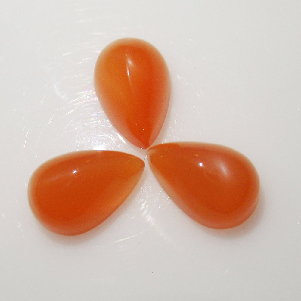 11.53 Ct Natural 3 Orange Moonstone Pear Set: Weight - 11.53 Ct / Size - 12.10 x 8.00 x 6.50 mm / Shape - Pear Cabochon / Pieces - 3 no's / Color - Orange / Clarity - Transparent / Origin - India / Treatment - None