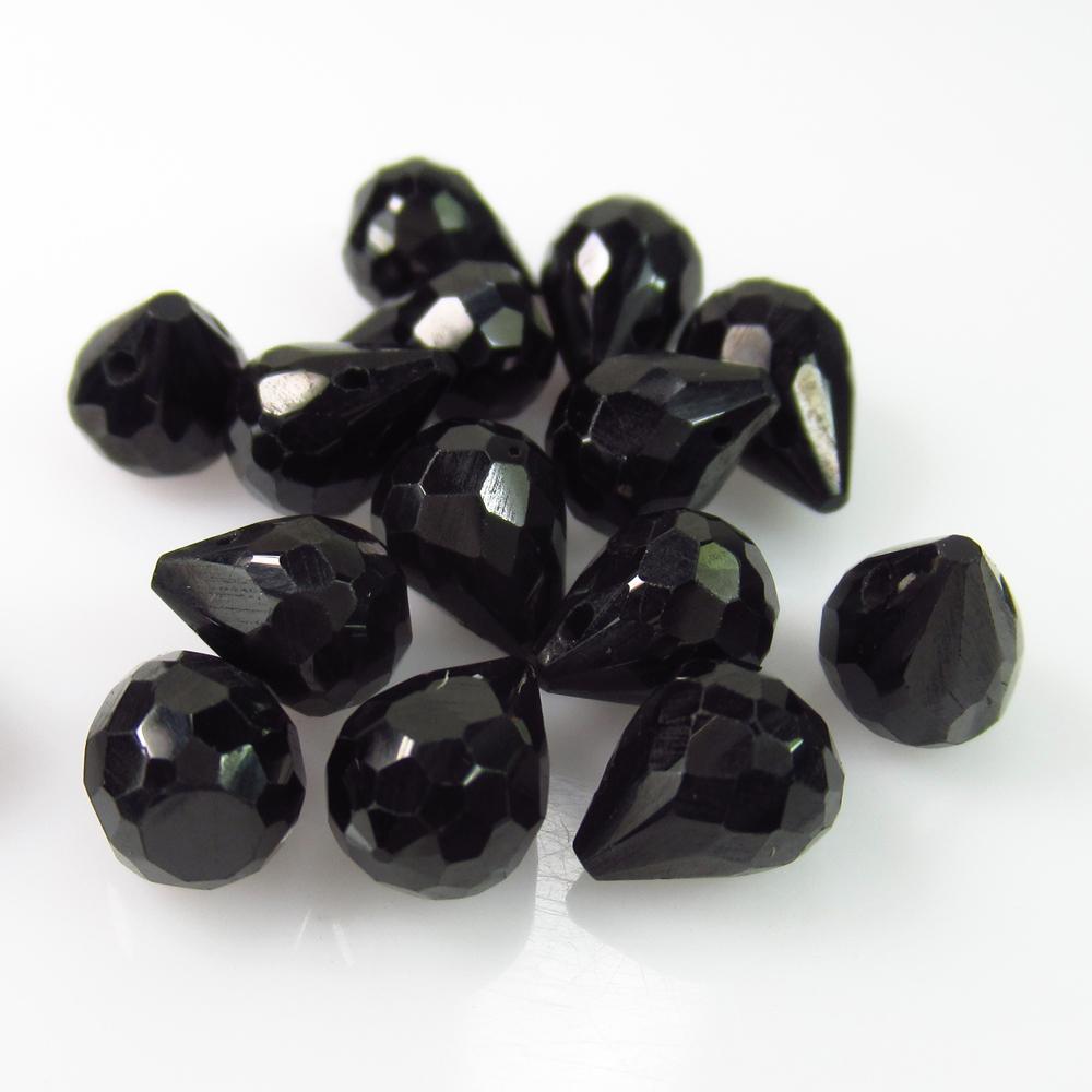 30.90 Ct Natural 15 Drilled Black Spinel Pear Drop: Weight - 30.90 Ct / Size -7.10x5.60 - 7.90x5.80 mm / 15 PC's / Shape - Pear Drop Beads / Color - Black / Clarity - VVS / Origin - Pakistan / Treatment - None