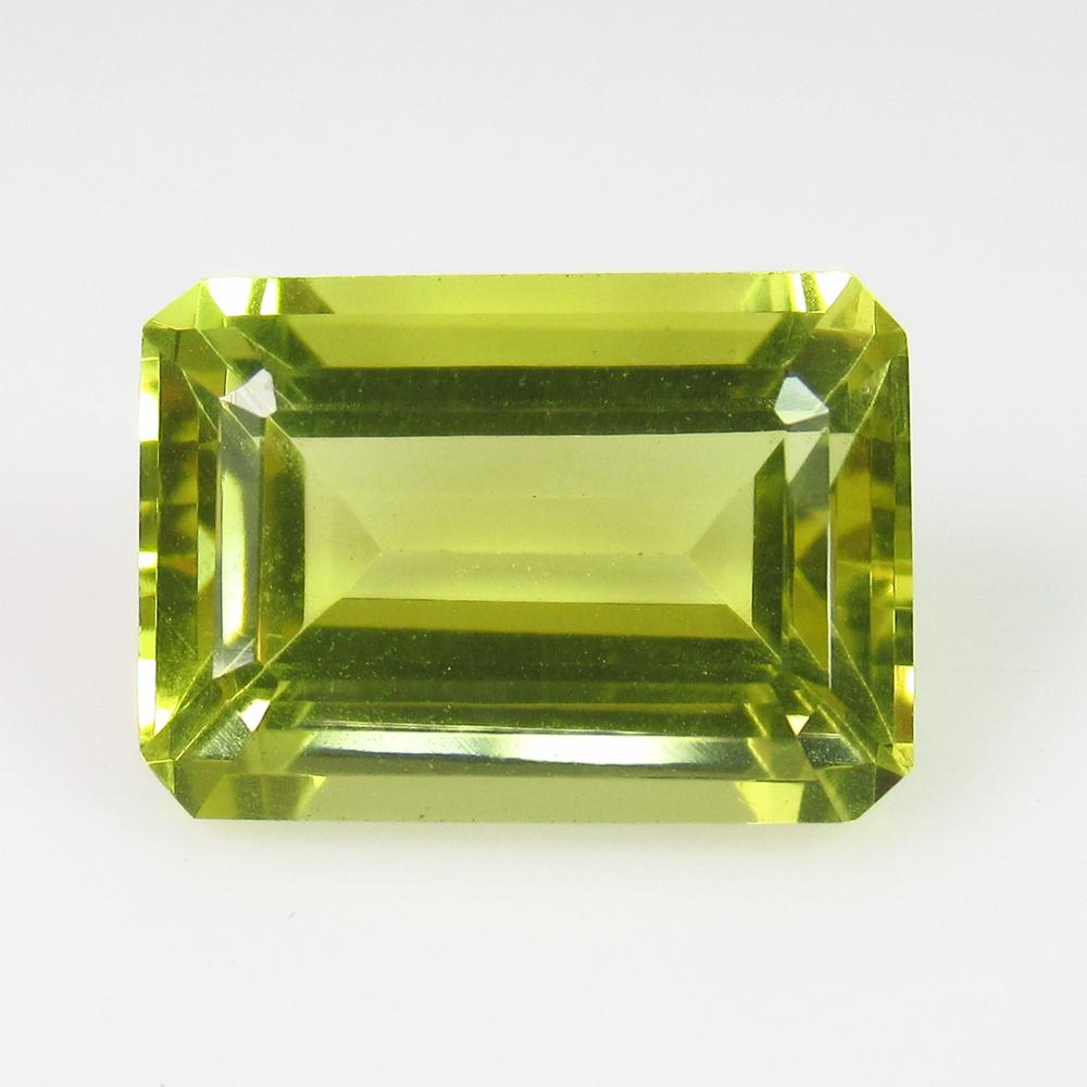 9.10 Ct Natural Lemon Quartz 14X10 mm Emerald Cut: Weight - 9.10 Ct / Size - 14.10 x 10.00 x 8.40 mm / Shape - Emerald Cut / Color - Yellow / Clarity - Transparent / Origin - Africa/ Treatment - None