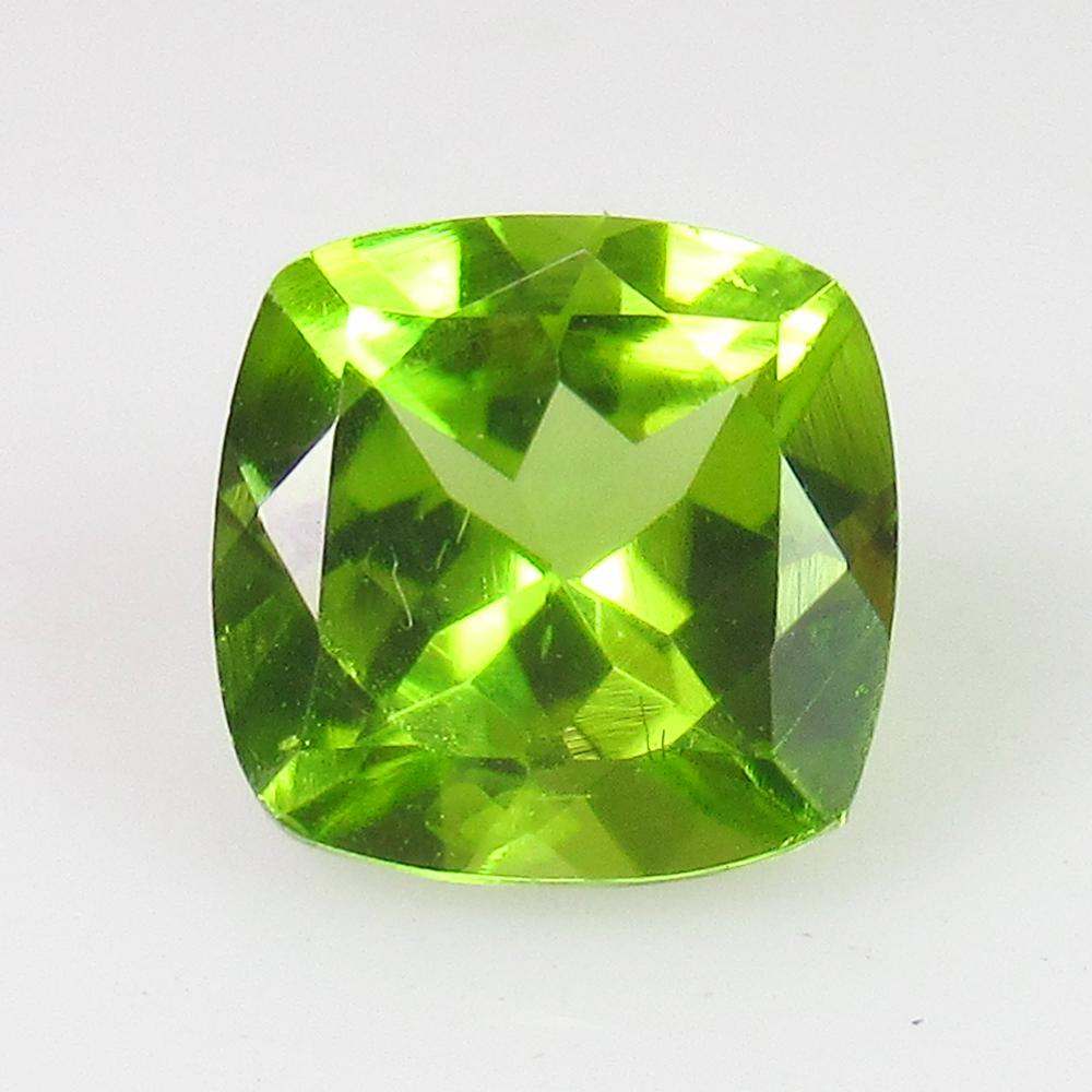1.74 Ct Natural Pakistan Peridot Cushion Cut: Weight - 1.74 Ct / Size - 7.20 x 7.20 x 4.60 mm / Shape - Cushion Cut / Color - Green / Clarity - VVS / Origin - Pakistan / Treatment - None