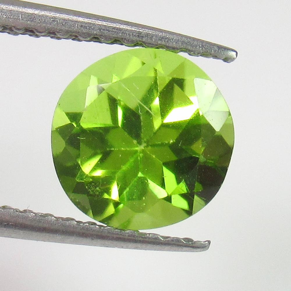 1.65 Ct Natural Pakistan Peridot Round Cut: Weight - 1.65 Ct / Size - 7.10 x 7.10 x 5.10 mm / Shape - Round Cut / Color - Green / Clarity - VVS / Origin - Pakistan / Treatment - None