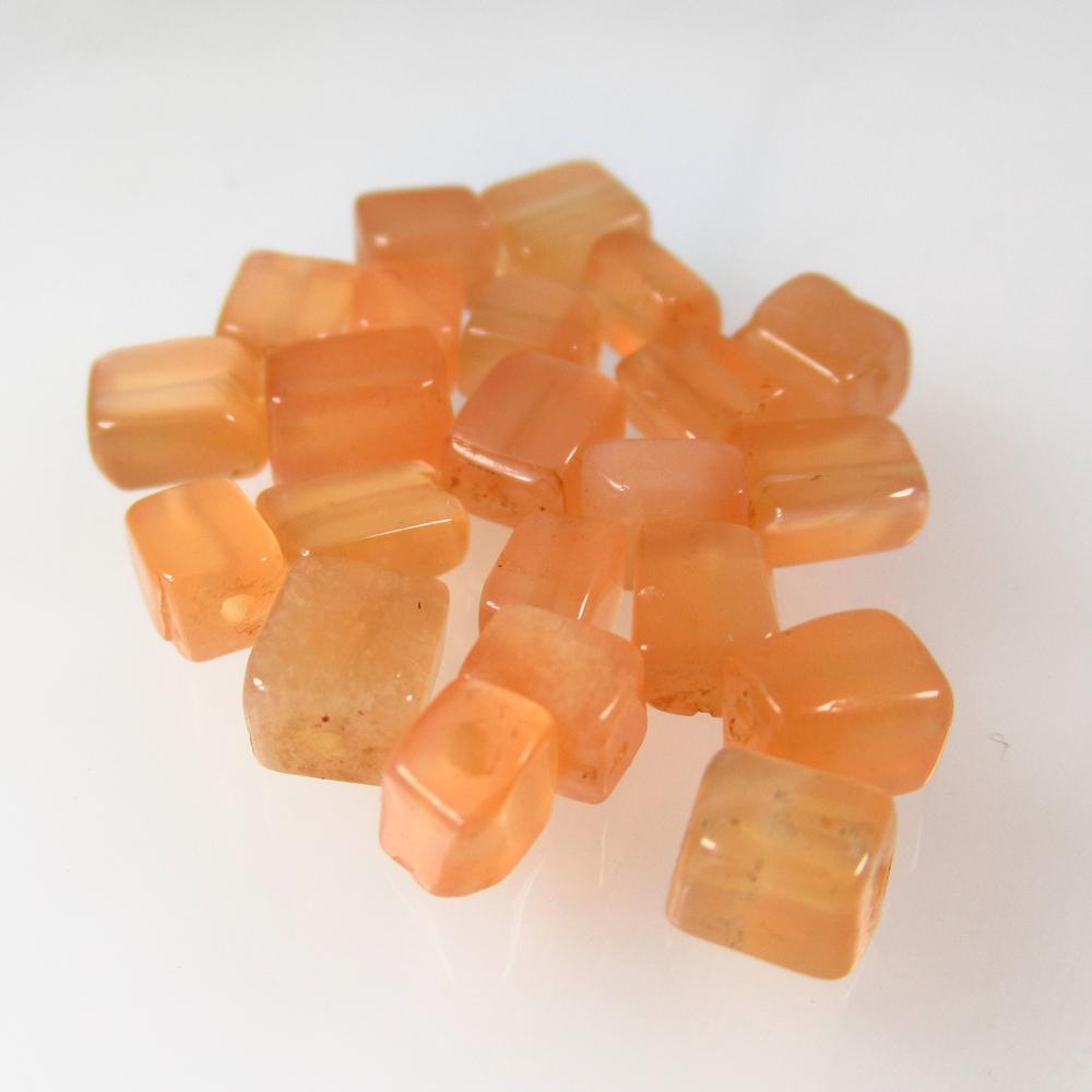 13.84 Ct Natural 21 Moonstone Beads: Weight - 13.84 Ct / Size - 4.3x3.7 - 5.0x4.2 mm / 21 Pc's / Shape - Drilled Square Beads / Color - Orange / Clarity - Translucent / Origin - India / Treatment - None