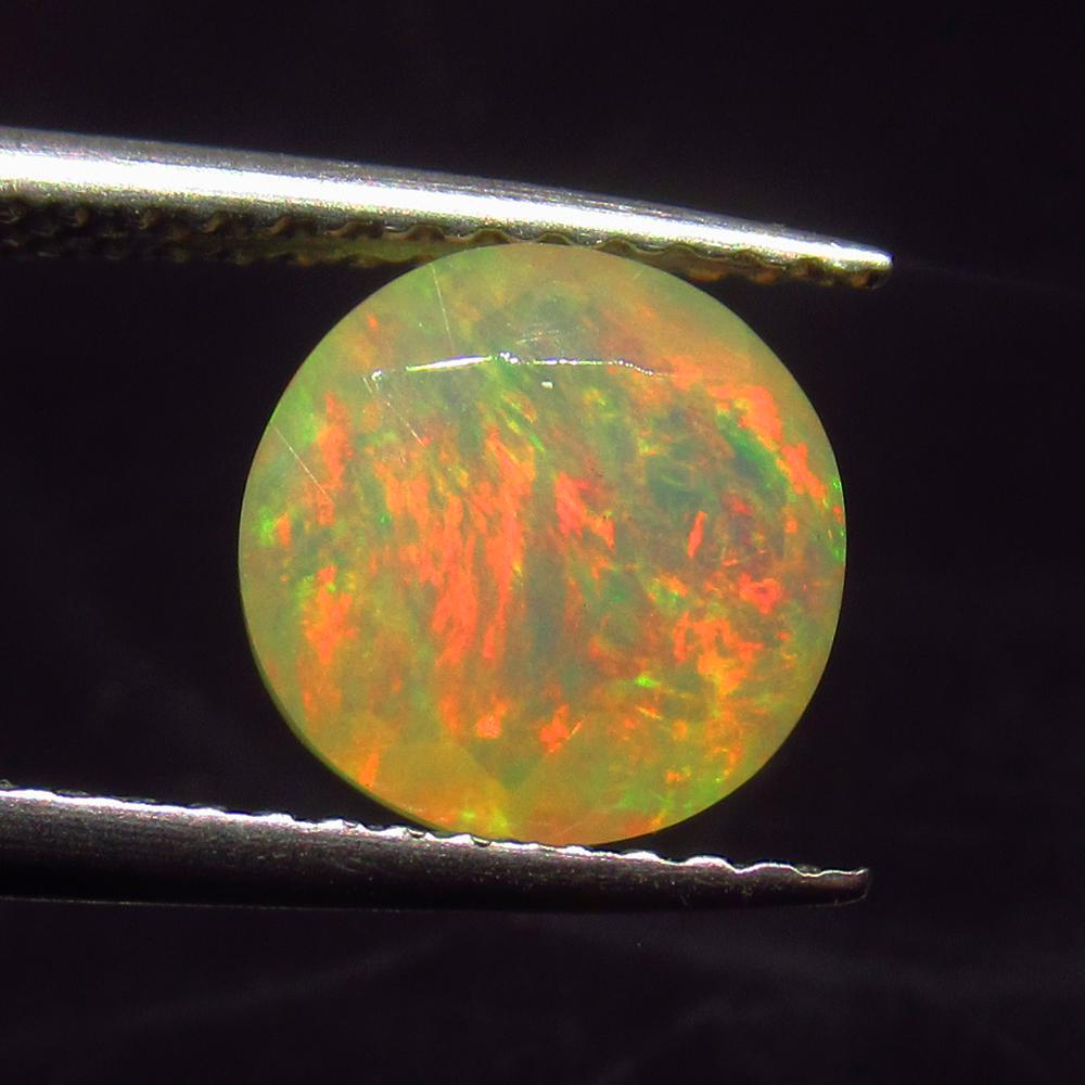 1.62 Ct Natural Multi-Color Welo Opal: Weight - 1.62 Ct / Size -8.10 x 8.10 x 5.90 mm / Shape - Round Cut / Color - Multicolor / Clarity - Translucent / Origin - Ethiopia / Treatment - None