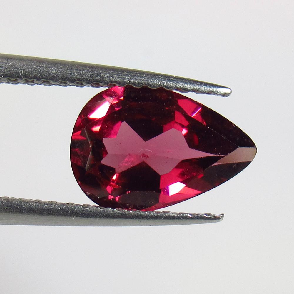 1.76 Ct Natural Rhodolite Garnet: Weight - 1.76 Ct / Size - 9.80 x 6.70 x 3.60 mm / Shape - Pear Cut / Clarity - VVs / Origin - Nigeria / Treatment - None
