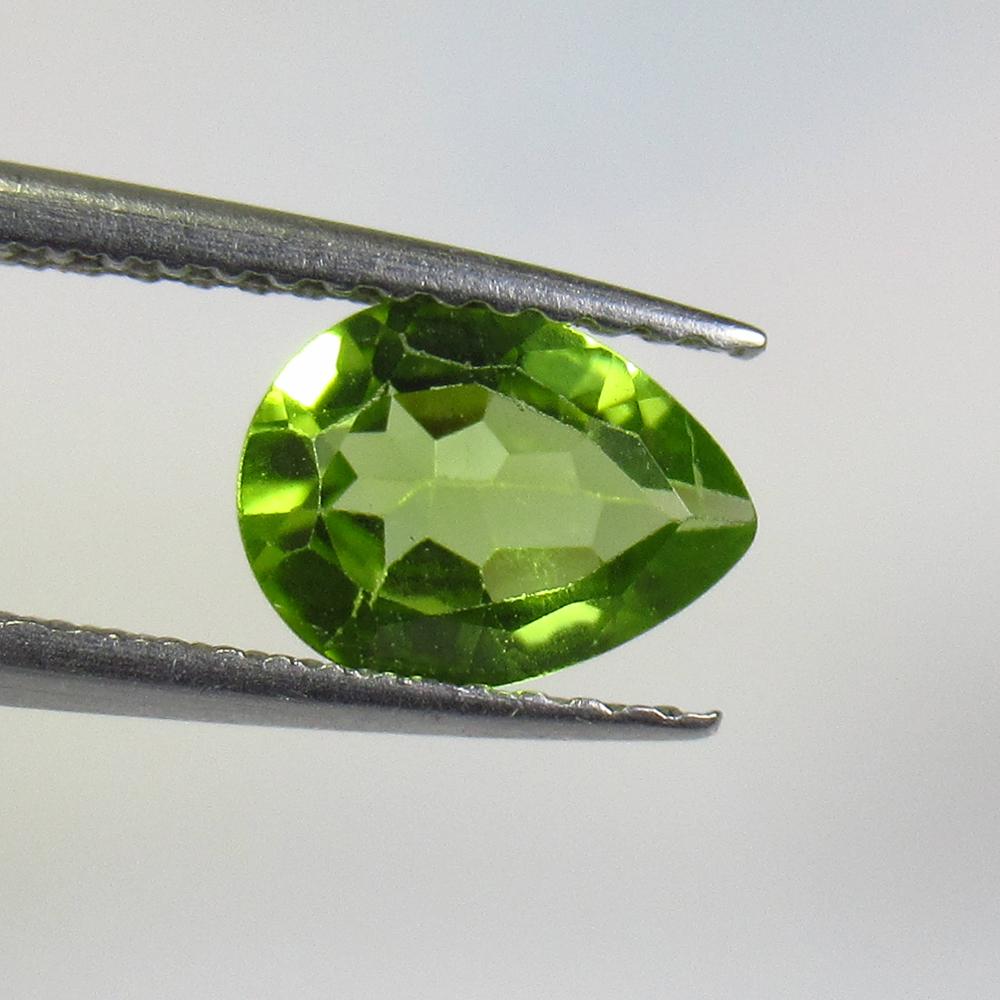 1.03 Ct Natural Peridot: Weight - 1.03 Ct / Size - 8.00 x 6.10 x 3.10 mm / Shape - Pear Cut / Color - Green / Clarity - VVS / Origin - Pakistan / Treatment - None