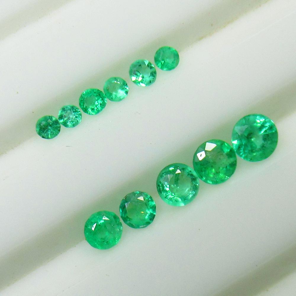 0.74 Ct Natural Emerald Set Loose Stones (1 of 2)