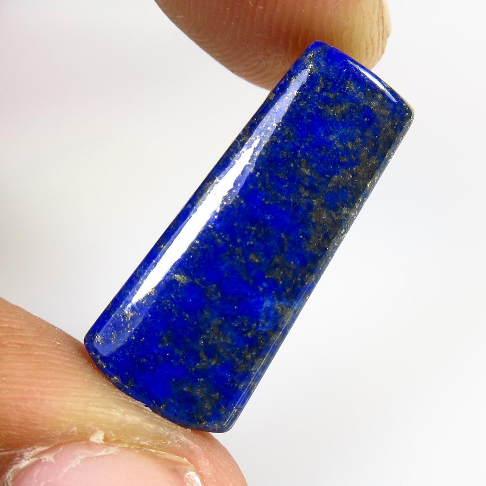 11.70 Ct Natural Blue Lapis Lazuli Cab Loose Stone: Weight - 11.70 Ct / Size -23.00 x 9.50 x 4.60 mm/ Shape - Drilled Fancy Cabochon / Clarity - Obaque / Origin - Afghanisthan / Treatment - None