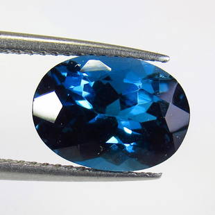 4.04 Ct Natural London Blue Topaz Loose Stone: Weight - 4.04 Ct / Size - 10.90 x 8.00 x 6.30 mm / Shape - Oval Cut / Color - Blue / Clarity - VVS / Origin - Brazil / Treatment - Irradiated