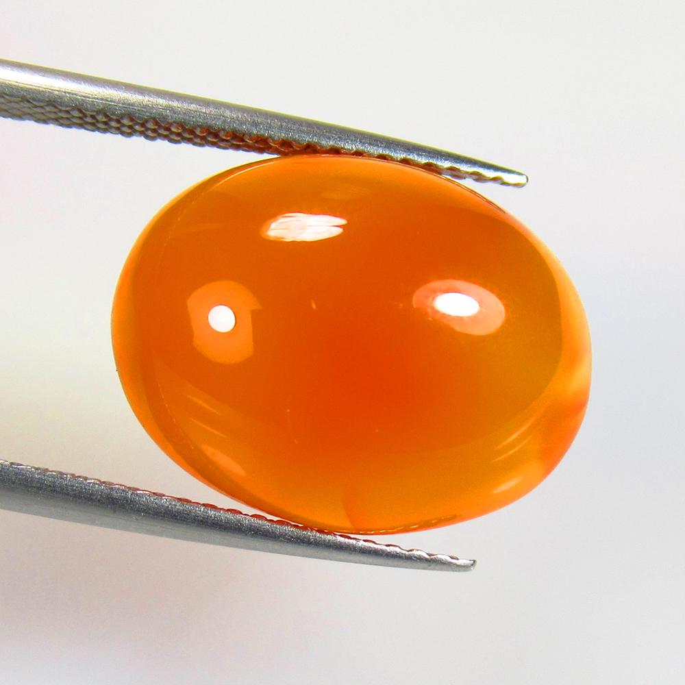 10.60 Ct Natural Carnelian Loose Stone: Weight - 10.60 Ct / Size - 16.80 x 13.20 x 6.50 mm / Shape - Oval Cabochon / Clarity - Semi - Transparent / Origin - Brazil