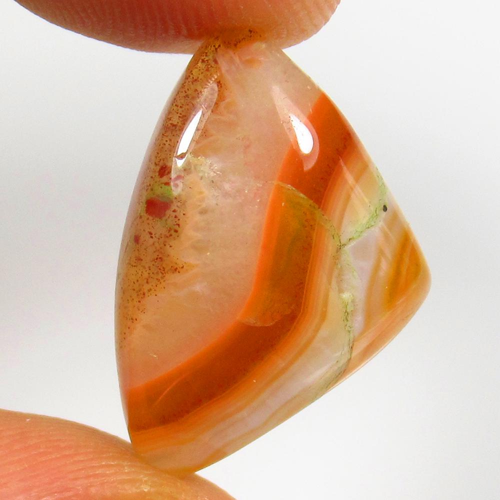 10.83 Ct Natural Banded Jasper Quartz Loose Stone: weight - 10.83 Ct / Size -20.00 x 15.00 x 6.00 mm / Shape - Excellent Trillion Cab / Origin - Brazil / Treatment - None