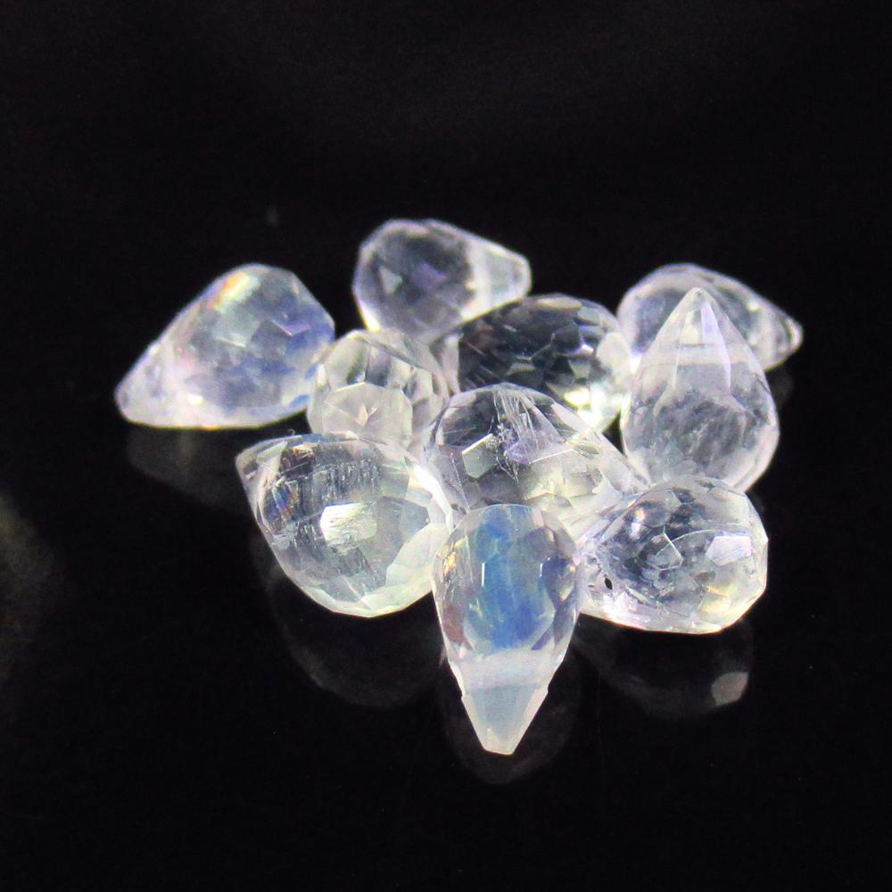6.47 Ct Natural 10 Blue Moonstone Loose Beads: Weight - 6.47 Ct / Size - 5.3x4.0 - 7.0x4.5 mm / 10 Pc's / Shape - Pear Drop Beads / Clarity - Semi-Transparent / Origin - India / Treatment - None