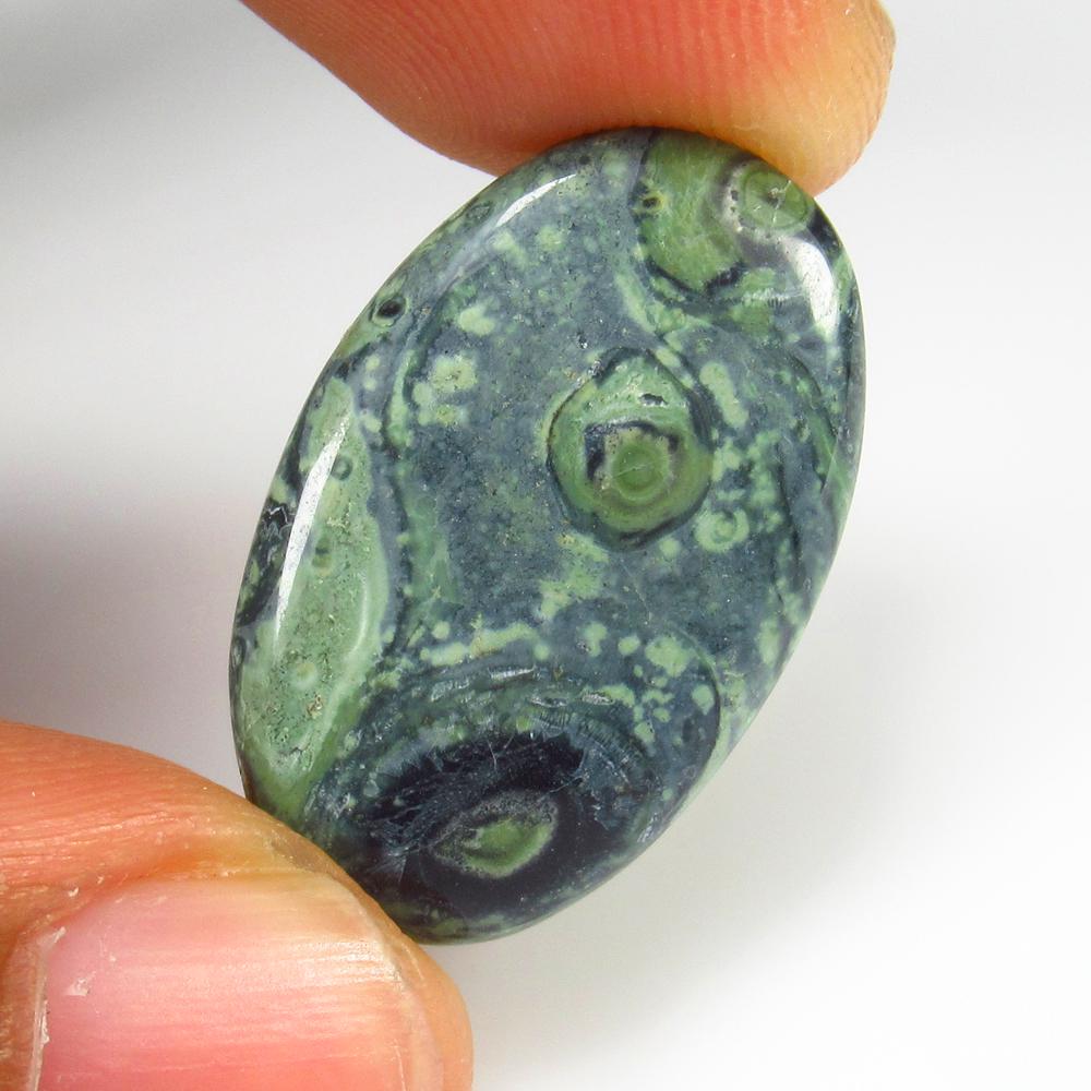 11.51 Ct Natural Green Jasper Loose Stone: Weight - 11.51 Ct / Size - 25.00 x 16.00 x 3.50 mm / Shape - Oval Cab / Clarity - Opaque / Origin - Brazil / Treatment - None