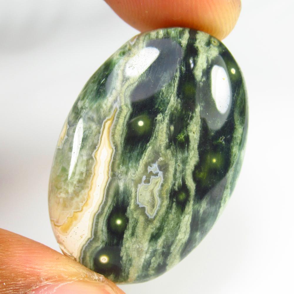 36.79 Ct Natural Green Jasper Loose Stone: Weight - 36.79 Ct / Size - 35.00 x 22.00 x 6.50 mm / Shape - Oval Cab / Clarity - Opaque / Origin - Brazil / Treatment - None