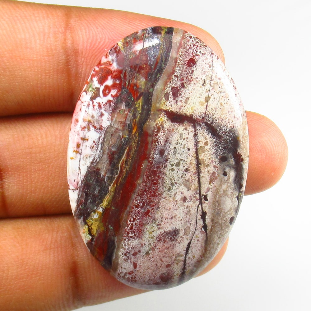 49.39 Ct Natural Rhyolite Jasper Loose Stone: weight - 49.39 Ct / Size - 45.00 x 3.00 x 5.00 mm / Shape - Excellent Oval Cab / Origin - Brazil / Treatment - None