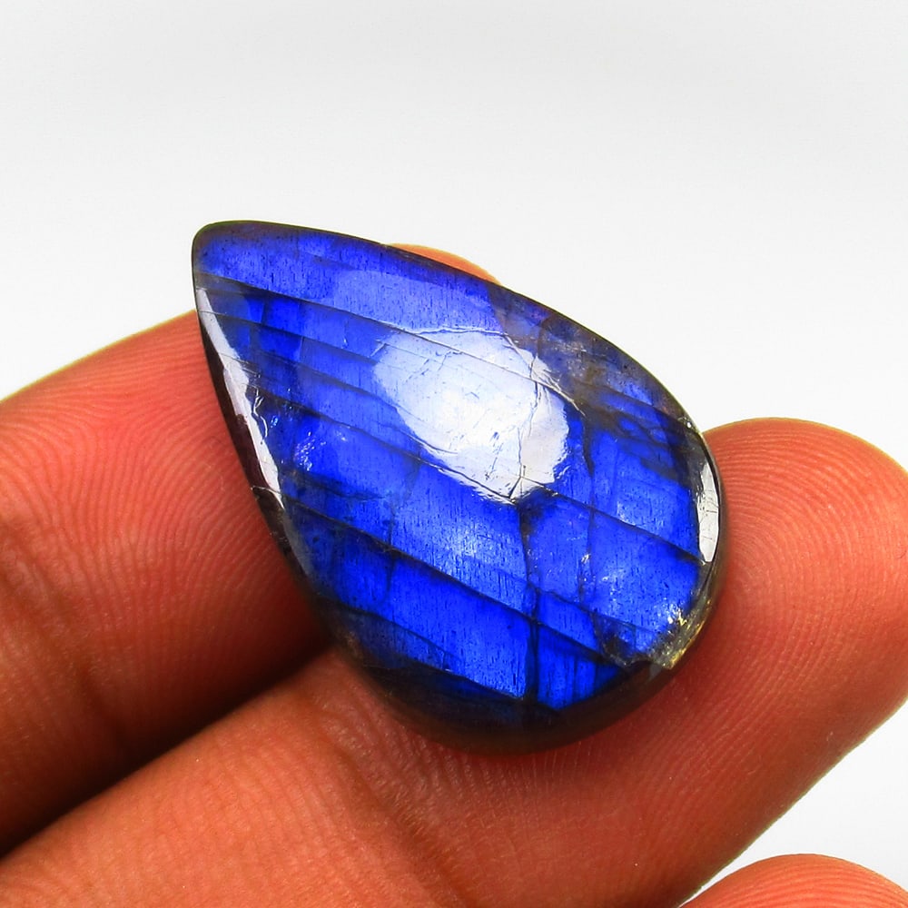 23.82 Ct Natural Labradorite Loose Stone: Weight - 23.82 Ct / Size - 28.00 x 17.00 x 6.50 mm / Shape - Excellent Pear Cab / Clarity - Opaque / Origin - Africa / Treatment - None