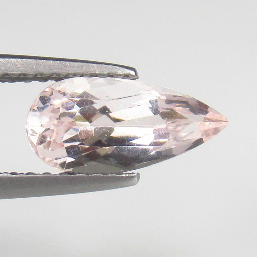 1.34 Ct Natural Morganite Loose Stone: Weight - 1.34 Ct / Size - 11.00 x 5.20 x 4.50 mm / Shape - Pear Cut / Color - Light Pink / Clarity - VVS / Origin - Mozambique / Treatment - None