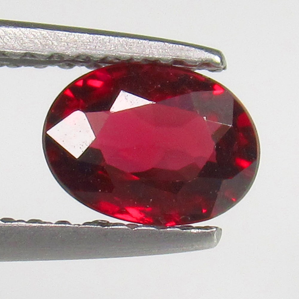 1.01 Ct Natural Rhodolite Garnet Loose Stone: Weight - 1.01 Ct / Size - 6.90 x 5.00 x 3.20 mm / Shape - Oval Cut / Color - Purplish Pink / Clarity - VVS / Origin - NIgeria / Treatment - None