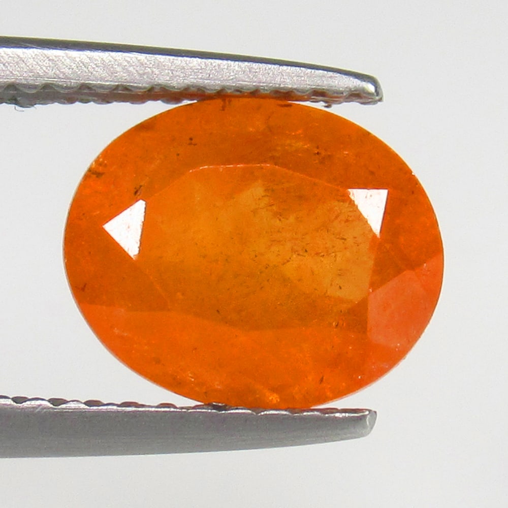 2.75 Ct Natural Spessartite Garnet Loose Stone: Weight - 2.75 Ct / Size - 9.00 x 7.50 x 4.50 mm / Shape - Oval Cut / Color - Orange / Clarity - VVS / Origin - Germany / Treatment - None