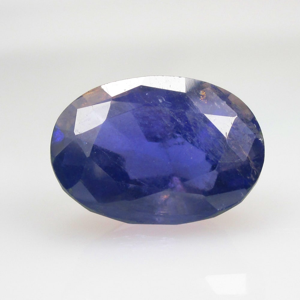 6.17 Ct Natural Iolite Loose Stone: Weight - 6.17 Ct / Size - 13.40 x 9.80 x 8.40 mm / Shape - Oval Cut / Color - Deep Violet / Clarity - VVS / Origin - Nigeria / Treatment - None
