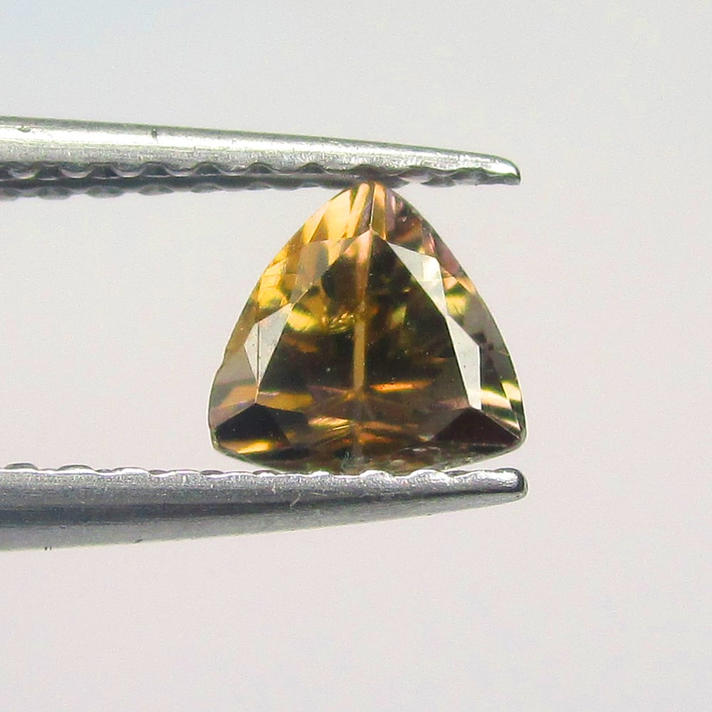0.55 Ct Natural Tanzanite Loose Stone: Weight - 0.55 Ct / Size - 5.10 x 5.00 x 3.80 mm / Shape - Trillion Cut / Clarity - VVS / Origin - Tanzania / Treatment - Unheated