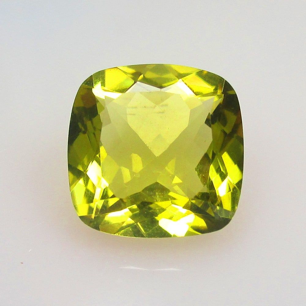 12.27 Ct Natural Lemon Quartz Loose Stone: Weight - 12.27 Ct / Size - 15.40 x 15.40 x 8.70 mm / Top Quality Luster / Excellent Cushion Cut / Origin - Brazil / Treatment - None