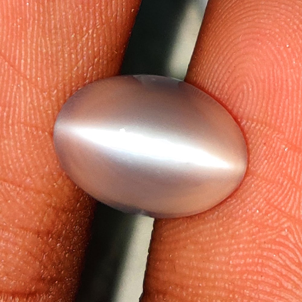 4.87 Ct Natural Moonstone Loose Stone: Weight - 4.87 Ct / Size - 11.80 x 8.60 x 6.70 mm / Shape - Oval Cab / Clarity - Semi-Transparent / Origin - India / Treatment - None