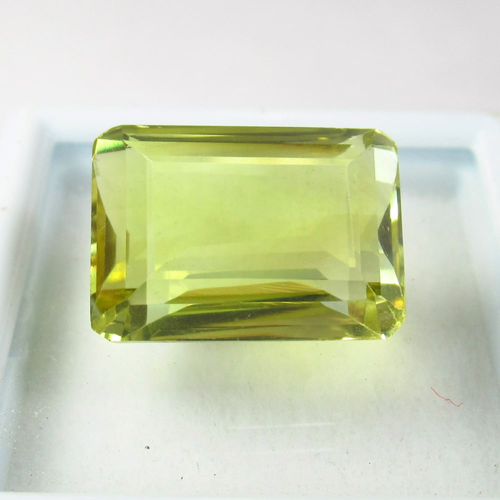 9.31 Ct Natural Lemon Quartz Loose Stone: Weight - 9.31 Ct / Size - 14.50 x 10.00 x 7.80 mm / Shape - Octagon Cut / Color - Yellow / Clarity - VVS / Origin - Africa / Treatment - None