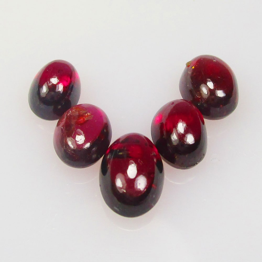9.10 Ct Natural Rhodolite Garnet Set Loose Stones: Weight - 9.10 Ct / Size - 7.0x5.1 - 9.0x6.0 mm / Shape - Oval Cab / Clarity - VVS / Origin - Nigeria / Treatment - None