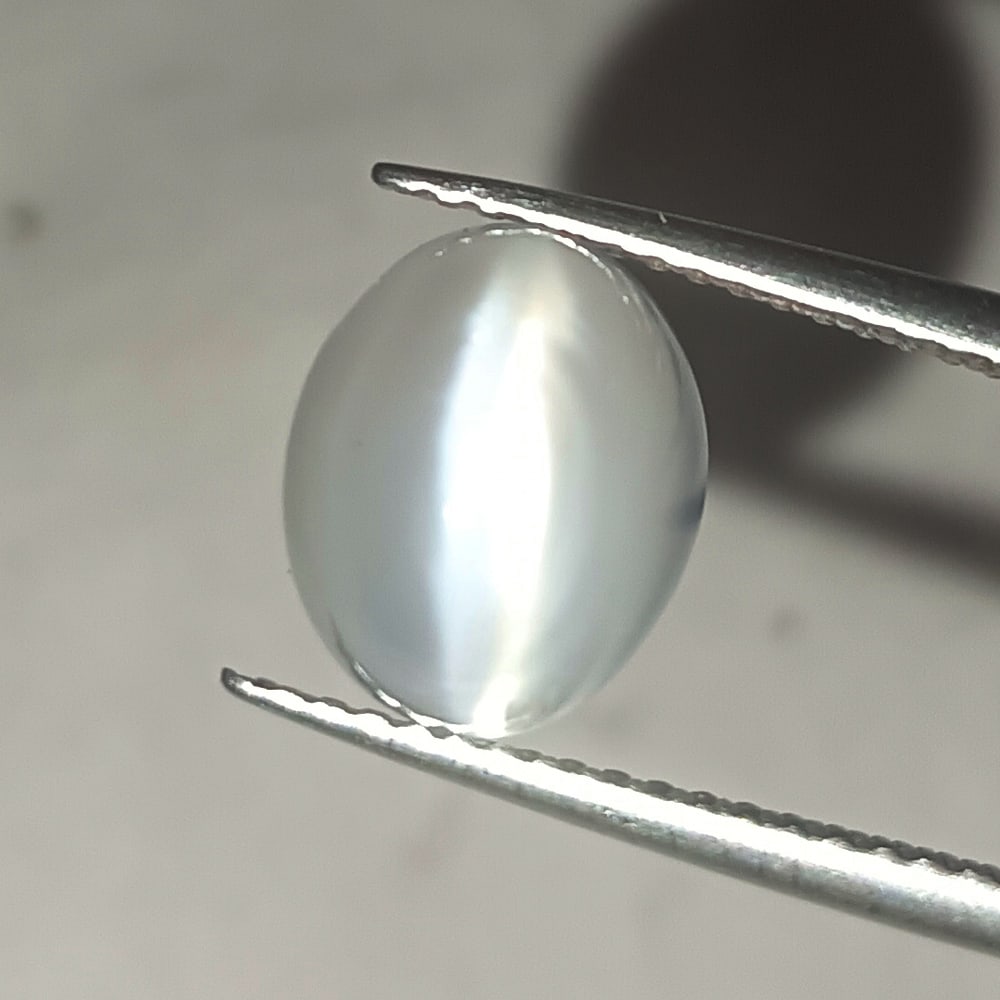 3.85 Ct Natural Moonstone Loose Stone: Weight - 3.85 Ct / Size - 9.70 x 8.20 x 6.80 mm / Shape - Oval Cab / Clarity - Semi-Transparent / Origin - India / Treatment - None