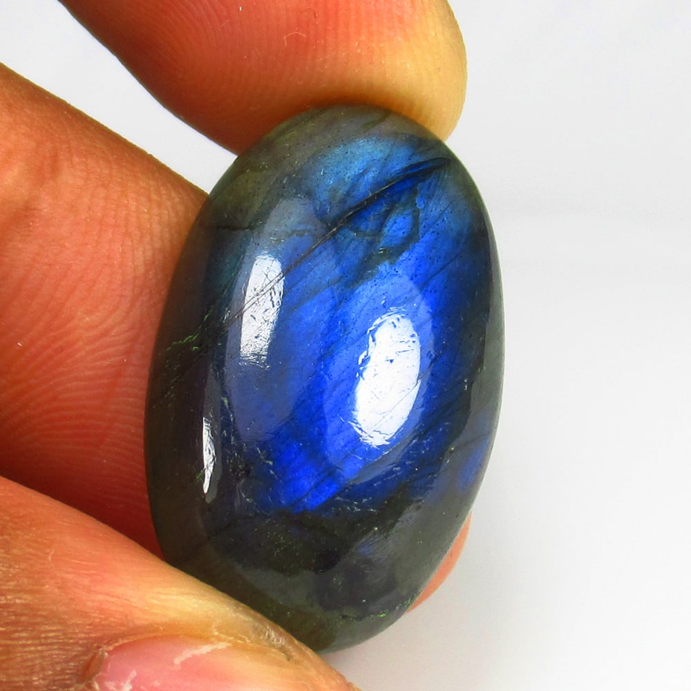 25.59 Ct Natural Labradorite Loose Stone: Weight - 25.59 Ct / Size - 28.00 x 16.30 x 7.00 mm / Shape - Excellent Oval Cab / Clarity - Opaque / Origin - Africa / Treatment - None