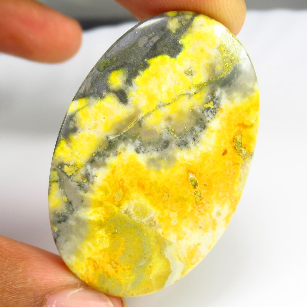 54.46 Ct Natural Bumblebee Jasper Loose Stone: weight - 54.46 Ct / Size - 42.00 x 28.00 x 5.80 mm / Shape - Excellent Oval Cab / Origin - Brazil / Treatment - None