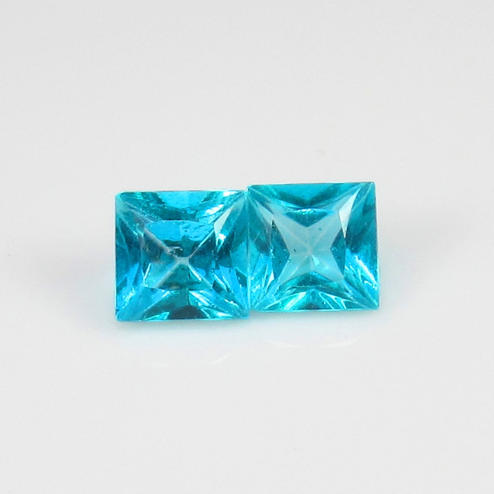 1.74 Ct Natural Deep Blue Topaz Loose Stone: Weight - 1.74 Ct / Size - 5.00 x 5.00 x 3.50 mm / 2 Pc's / Shape - Square Cut / Color - Blue / Clarity - VVS / Origin - Brazil / Treatment - Color Coated