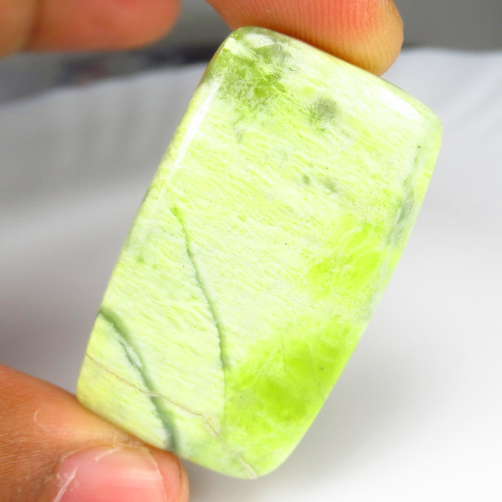 54.18 Ct Natural Lemon Chrysoprase Loose Stone: weight - 54.18 Ct / Size - 40.00 x 23.00 x 6.00 mm / Shape - Excellent Cushion Cab / Origin - Brazil / Treatment - None