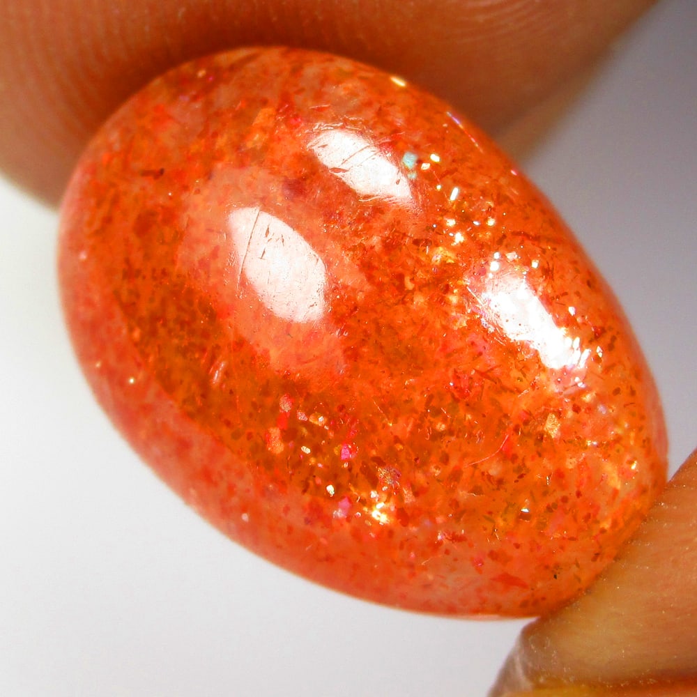 7.60 Ct Natural Sunstone Loose Stone: Weight - 7.60 Ct / Size - 15.70 x 10.80 x 5.80 mm / Shape - Oval Cab / Clarity - Opaque / Origin - Brazil / Treatment - None