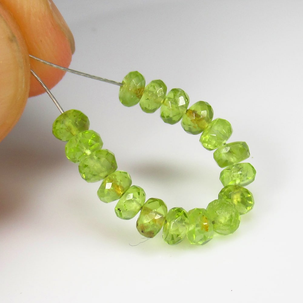 4.91 Ct Natural 17 Peridot Loose Beads: Weight - 4.91 Ct / Size - 3.50 - 3.90 mm / 17 Pc's / Shape - Drilled Round Beads / Color - Green / Clarity - VVS / Origin - Pakistan / Treatment - None