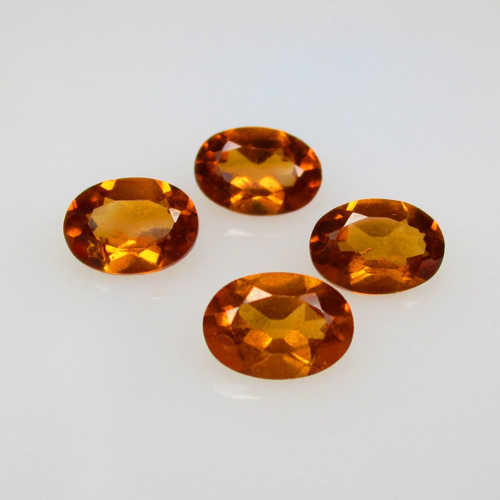 3.37 Ct Natural Hessonite Garnet Set Loose Stones: Weight - 3.37 Ct / Size - 7.0x5.0 - 7.2x5.1 mm / 4 Pc's / Shape - Oval Cut / Clarity - VVS / Origin - Nigeria / Treatment - None