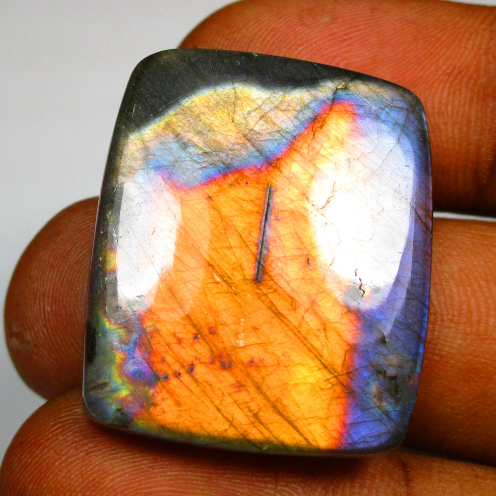 51.65 Ct Natural Labradorite Loose Stone: Weight - 51.65 Ct / Size - 29.50 x 24.80 x 7.00 mm / Shape - Excellent Cushion Cab / Clarity - Opaque / Origin - Africa / Treatment - None