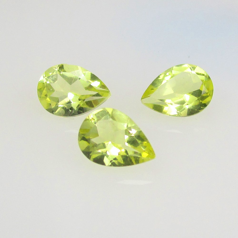1.96 Ct Natural Lemon Quartz Set Loose Stones: Weight - 1.96 Ct / Size - 7.0x5.1 - 7.1x5.2 mm / 3 Pc's / Top Quality Luster / Excellent Pear Cut / Origin - Brazil / Treatment - None