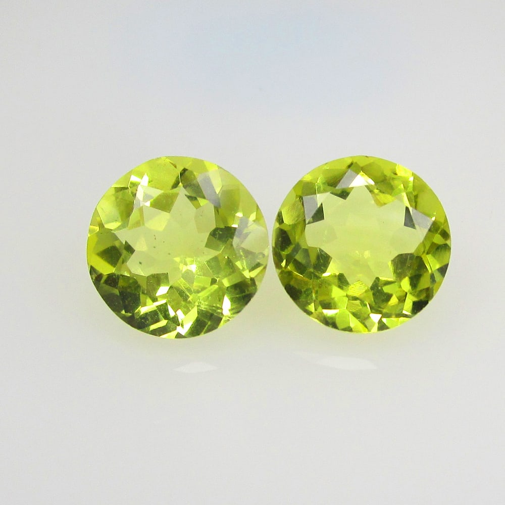 4.92 Ct Natural Lemon Quartz Pair Loose Stones: Weight - 4.92 Ct / Size - 9.20 x 9.20 x 5.50 mm / 2 Pc's / Top Quality Luster / Excellent Round Cut / Origin - Brazil / Treatment - None