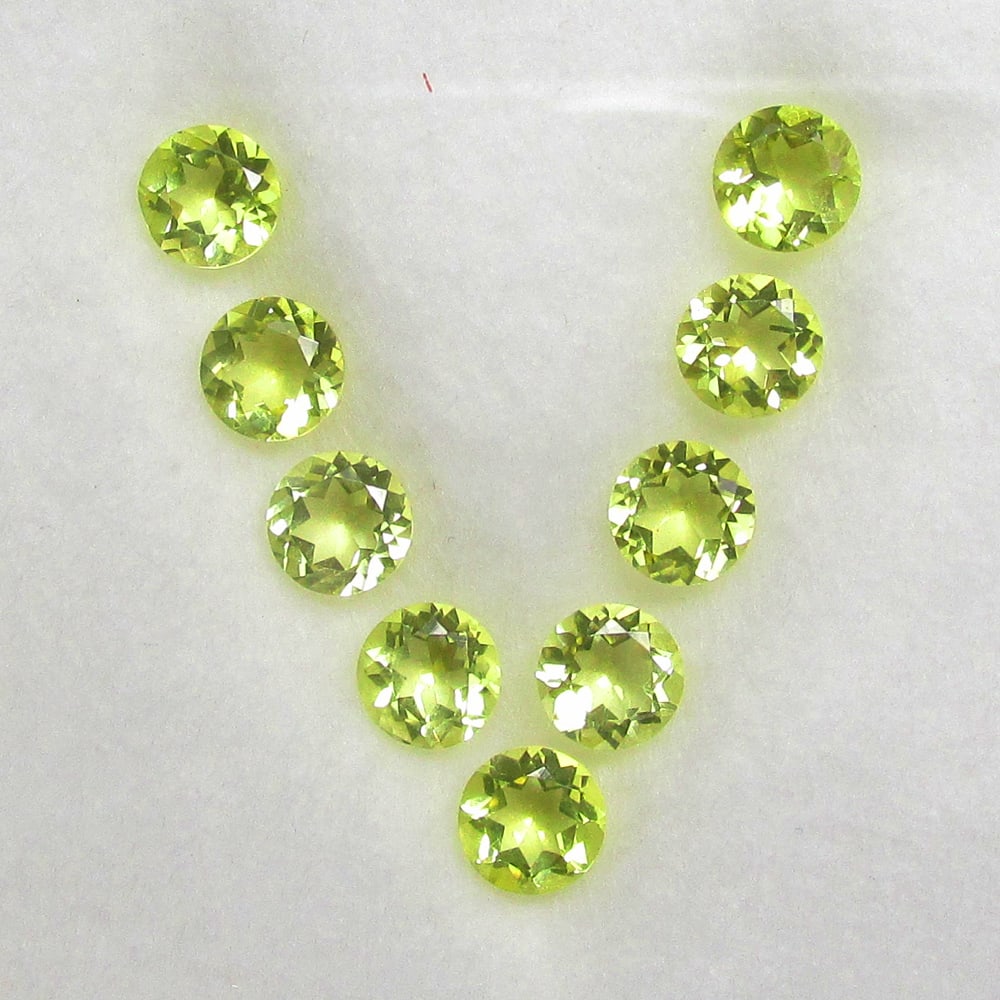 4.26 Ct Natural Lemon Quartz Set Loose Stones: Weight - 4.26 Ct / Size - 5.10 - 5.20 mm / 9 Pc's / Top Quality Luster / Excellent Round Cut / Origin - Brazil / Treatment - None