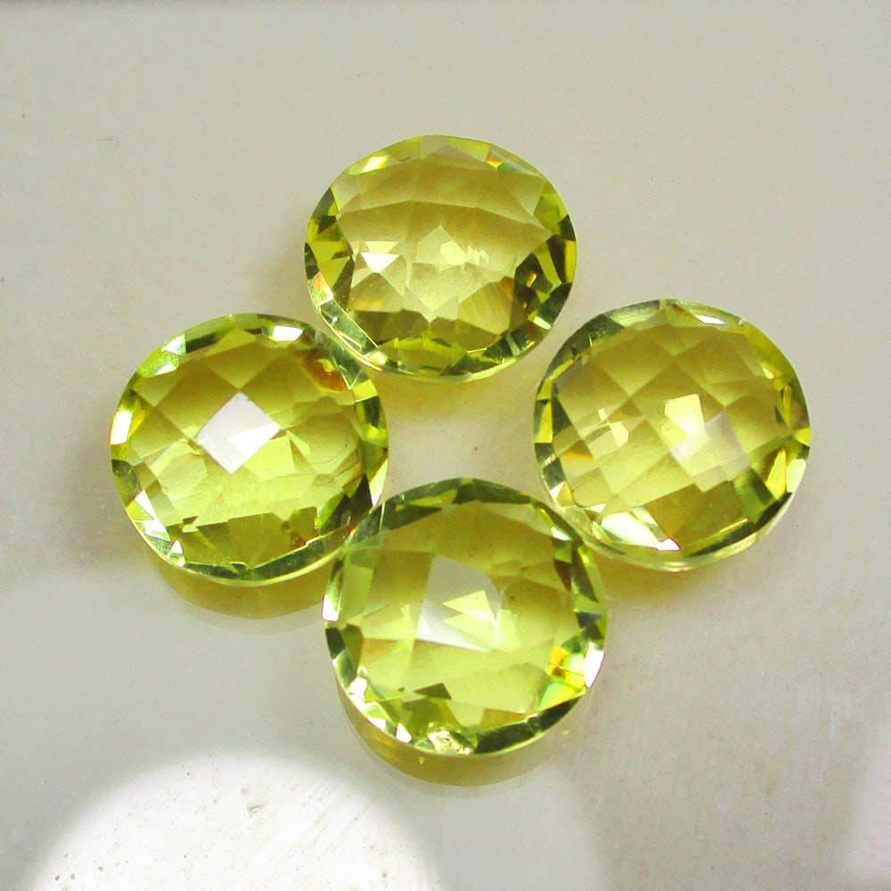 12.66 Ct Natural Lemon Quartz Set Loose Stones: Weight - 12.66 Ct / Size - 9.90 - 10.00 mm / 4 Pc's / Top Quality Luster / Excellent Round Checkerboard Cut / Origin - Brazil / Treatment - None