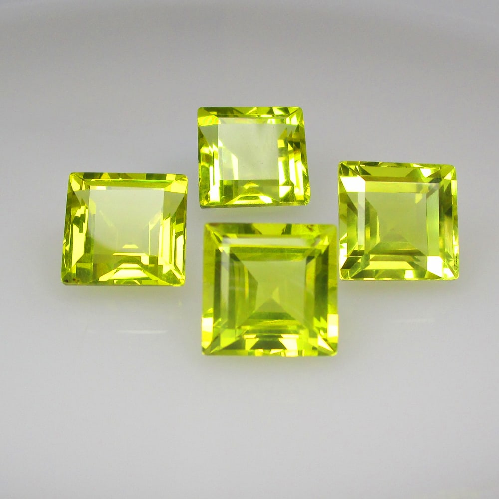 26.67 Ct Natural Lemon Quartz Set Loose Stones: Weight - 26.67 Ct / Size - 10.8x7.2 - 11.0x8.1 mm / 4 Pc's / Top Quality Luster / Excellent Square Cut / Origin - Brazil / Treatment - None