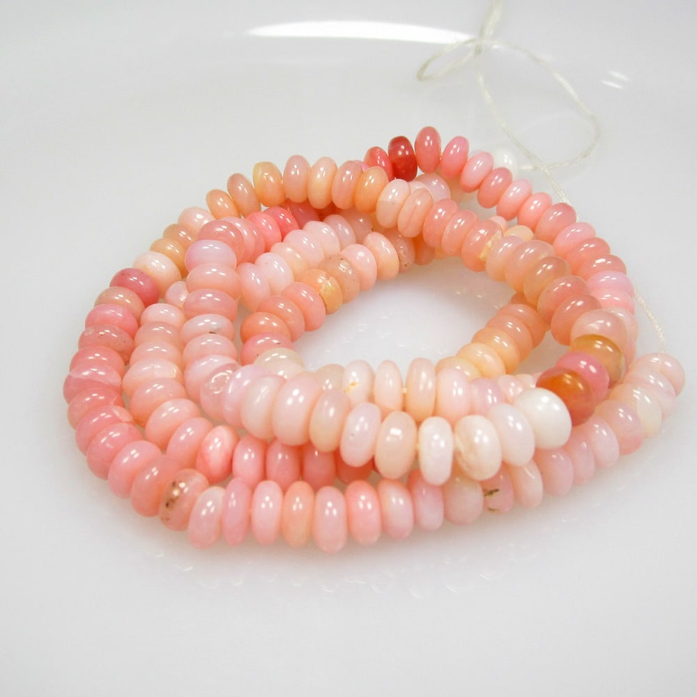 84.38 Ct Natural 168 Pink Opal Loose Beads: Weight - 84.38 Ct / Size - 5.40 - 5.90 mm / 168 Pc's / 19" inches / Shape - Round Beads / Color - Pink / Clarity - Opaque / Origin -Peru / Treatment - None
