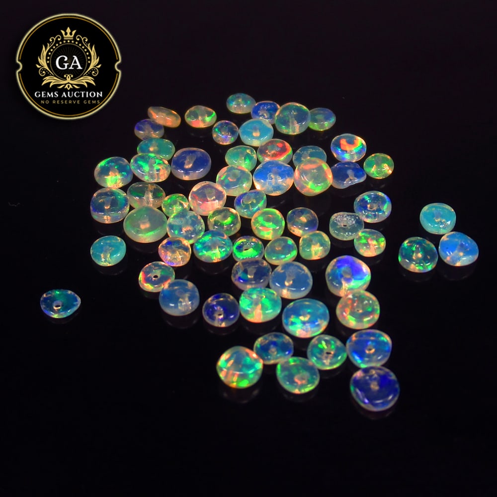 4.37 Ct Natural 61 Drilled Multi-color Fire Opal Loose Beads: Weight - 4.37 Ct / Size - 2.90 - 3.70 mm / Pieces - 61 No's / Shape -Round Beads / Color - Multicolor / Clarity - Transparent / Origin - Ethiopia / Treatment - None